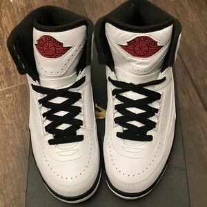 Air Jordan two retro. Brand new never worn. Size 5 youth / 6.5 women’s